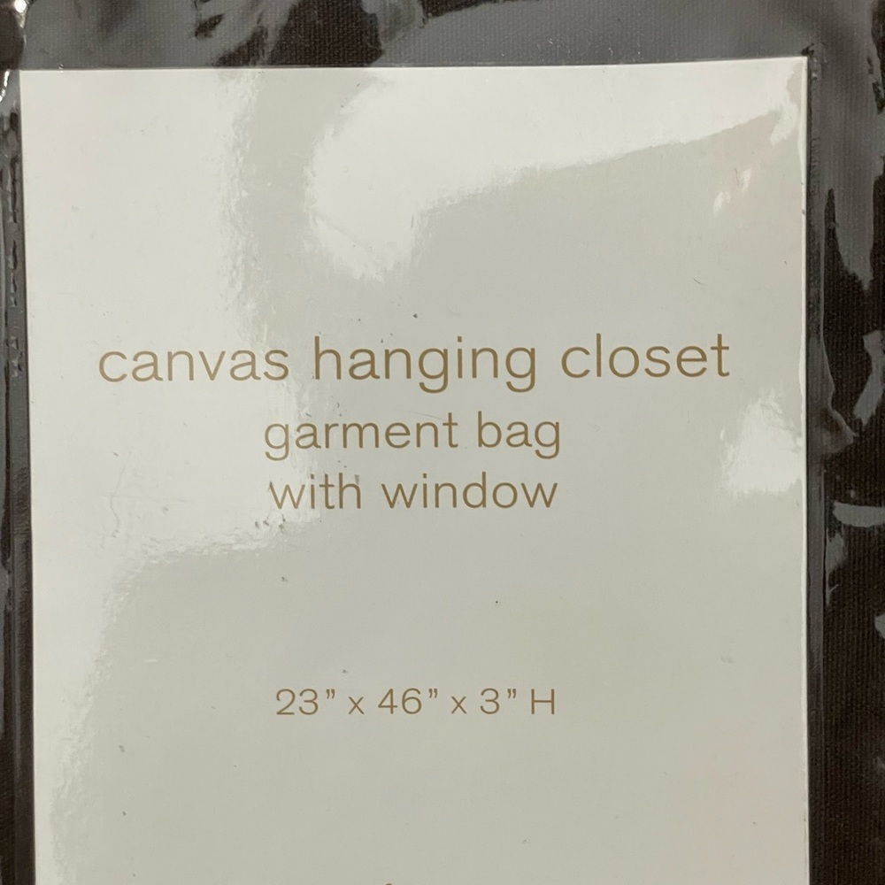 West Elm canvas hanging closet garment bag with window
23" × 46" × 3" H‎ NIB